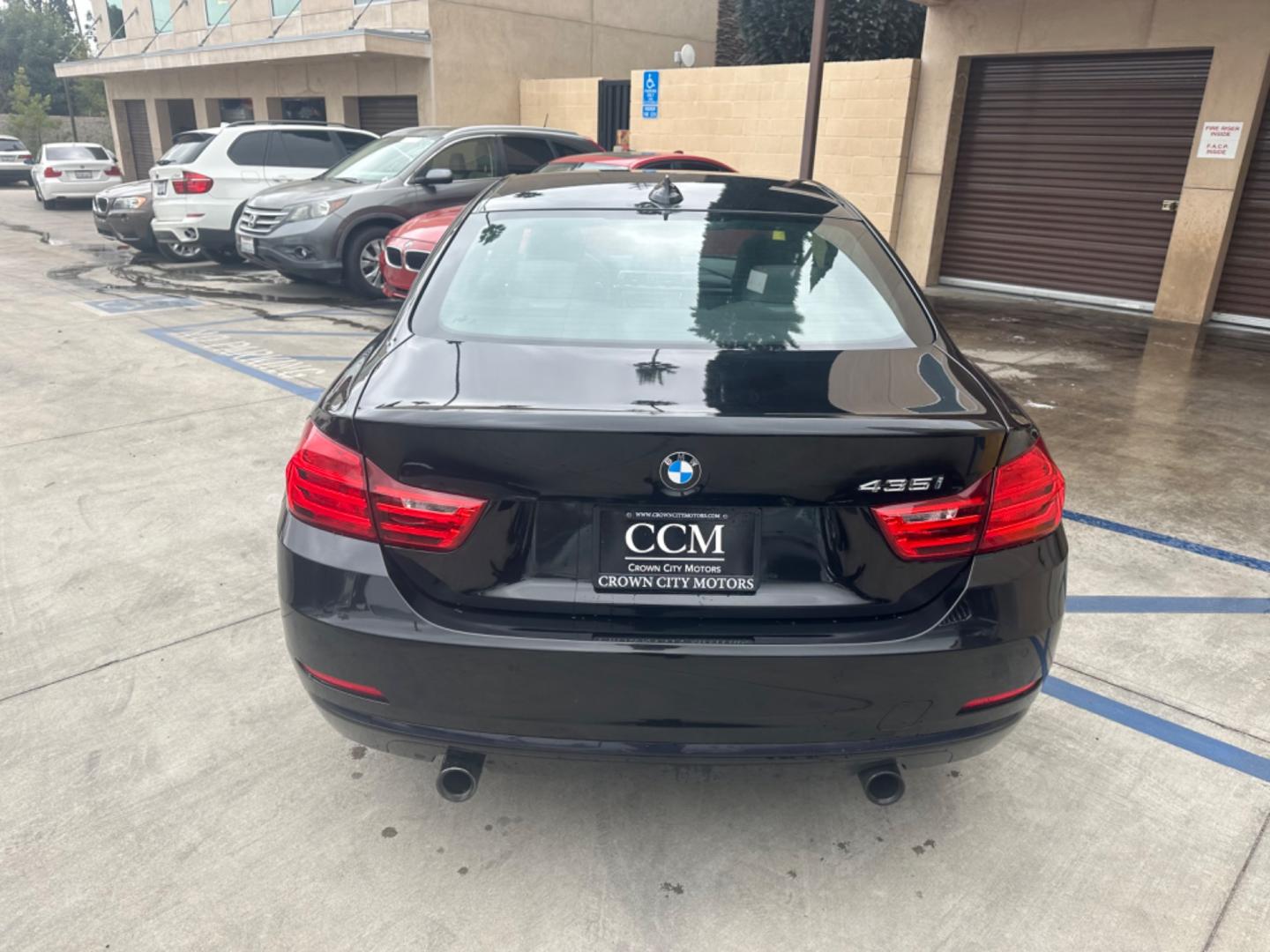 2015 Black BMW 4-Series 435i coupe (WBA3R1C55FK) with an 3.0L V6 DOHC 24V engine, 8-Speed Automatic transmission, located at 30 S. Berkeley Avenue, Pasadena, CA, 91107, (626) 248-7567, 34.145447, -118.109398 - Crown City Motors is a used “Buy Here Pay Here” car dealer in Pasadena CA. “Buy Here Pay Here” financing, means that when you purchase your vehicle from our dealership, that you make the payments to the dealership as well. We do not need the banks approval to get you approved for a used auto - Photo#3